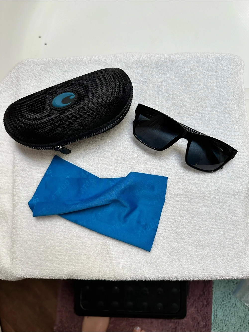 Costa Del Mar Paunch 580P Black Frame Sunglasses with Blue Lenses